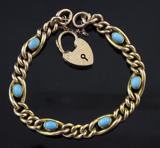 An Edwardian 9ct gold curb link bracelet set with six oval turquoise cabochons, gross 14 grams.